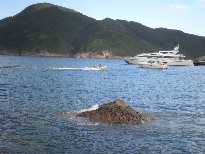 Yachts and Water Skis in Big Wave Bay. 